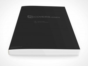 Paperback Book Mockup | High angle view of closed book laying on surface